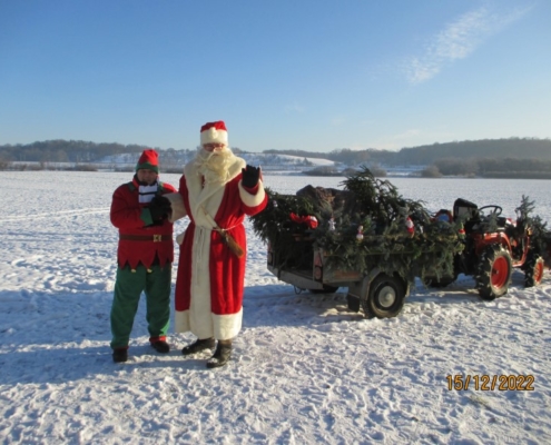 Weihnachtsmann modern mit Traktor